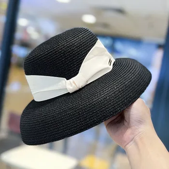 2023 Нова лятна сламена шапка за жени Елегантен Bowknot Хепбърн стил реколта дизайн широка странична шапка за слънце Anti-UV почивка плажна шапка
